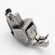 Piciorus compensator stanga ingust cu rola dintata de metal pentru masini industriale de cusut simple cu 1 ac, 1/32" (1mm)