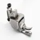 Piciorus compensator stanga ingust cu rola dintata de teflon pentru masini industriale de cusut simple cu 1 ac, 1/32" (1mm)